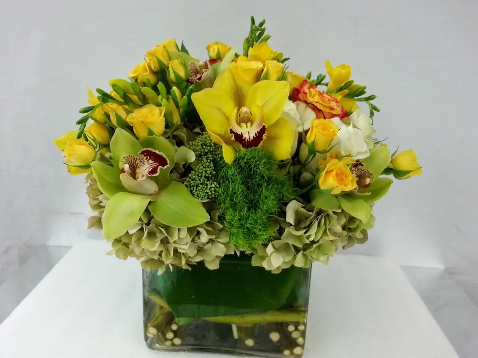 Oncidium-Orchids-arrangements-muguet-flowers-yellow-green-bow-Arrangements.webp