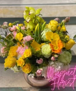 Sunny Bouquet Radiance: A Mix of Fresh Flowers in a Rose Gold Glass Bowl